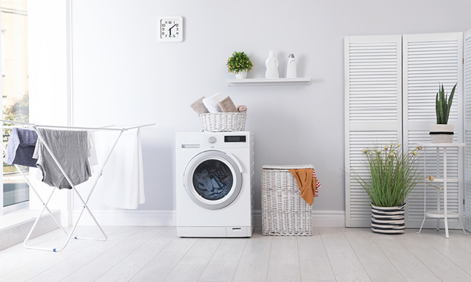 open-concept-laundry-room-with-clothes-and-linens