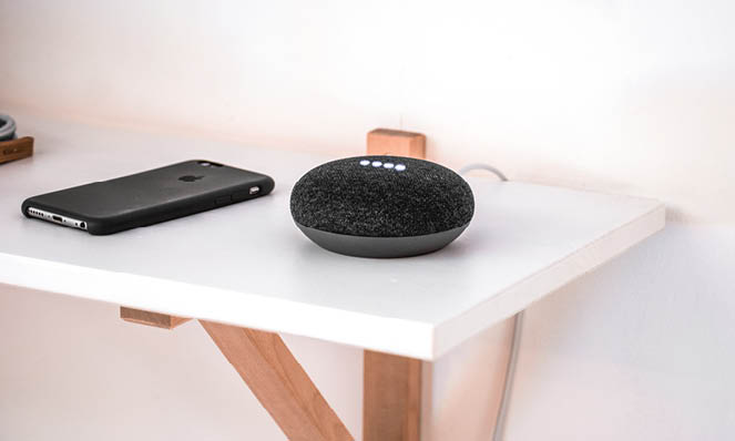 phone-and-speaker-on-desk