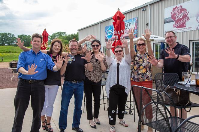 Branch and corporate employees celebrate Appleton's 10th anniversaty with a group photo