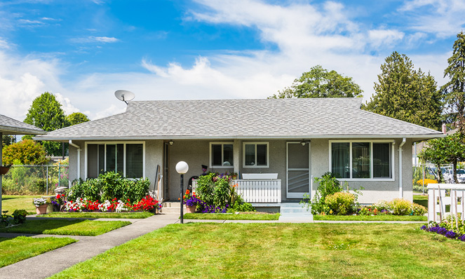 grey-ranch-home-nice-landscaping-walkway