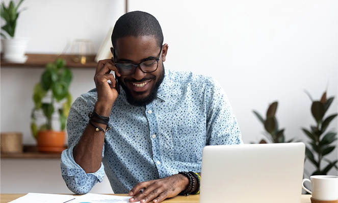 happy-man-black-glasses-talking-on-the-phone