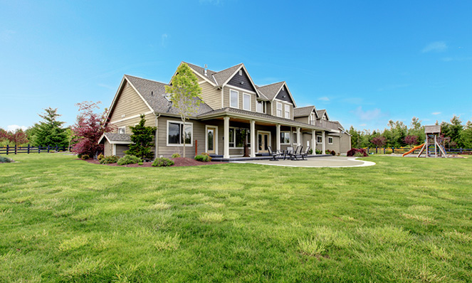 large-green-yard-home-play-area-grey-home-open-area