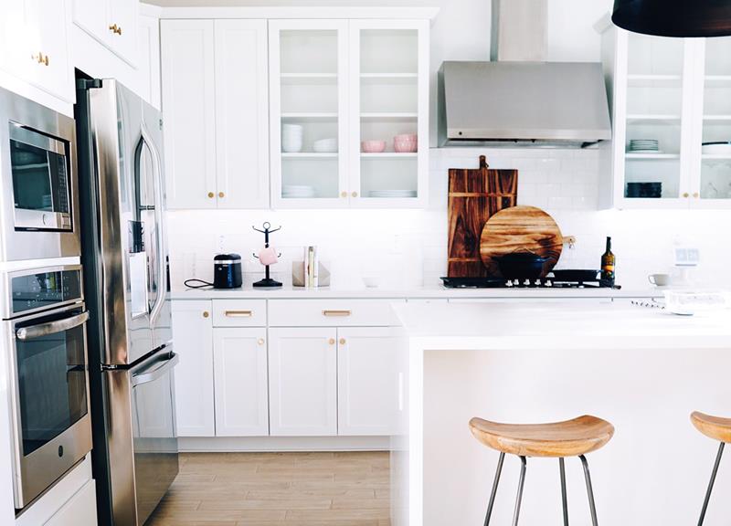 white-home-kitchen-wood-accents-stainless-steel-appliances