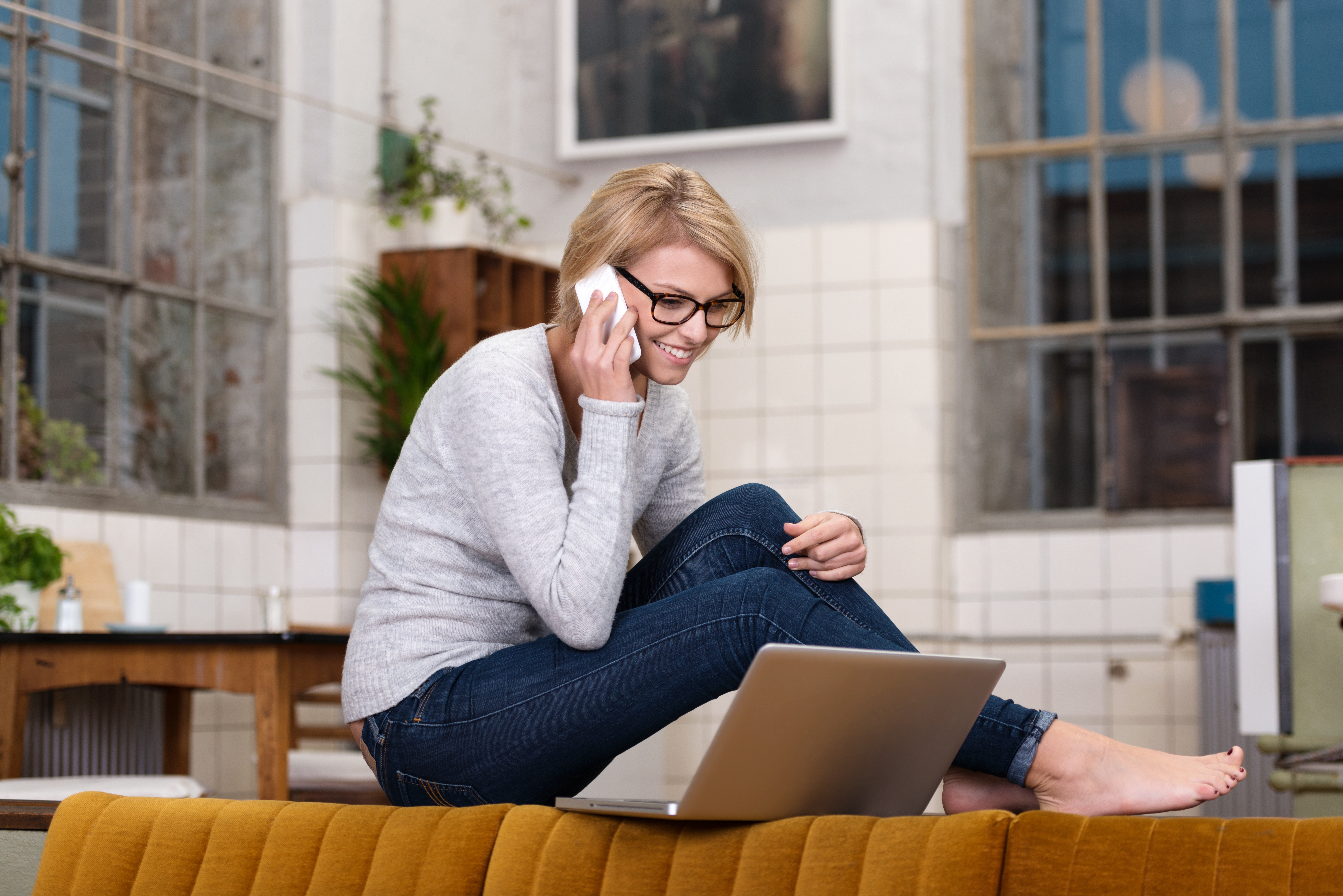 young-woman-working-home-sitting