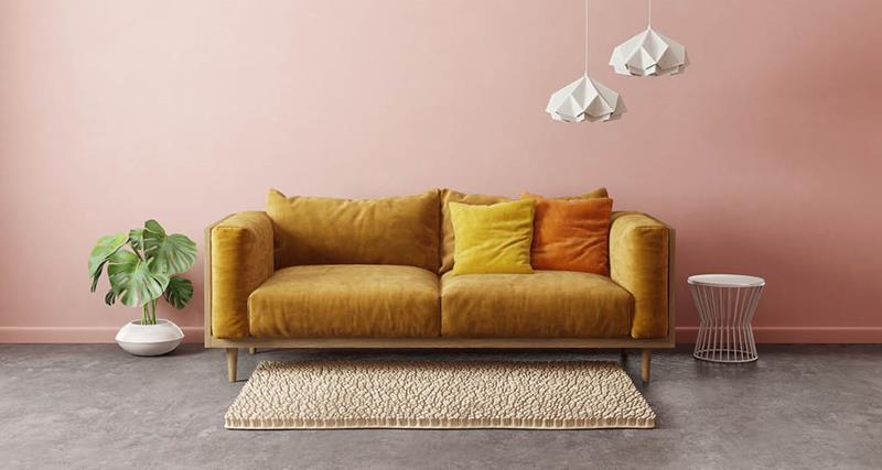 coral-wall-mustard-couch-plant-table