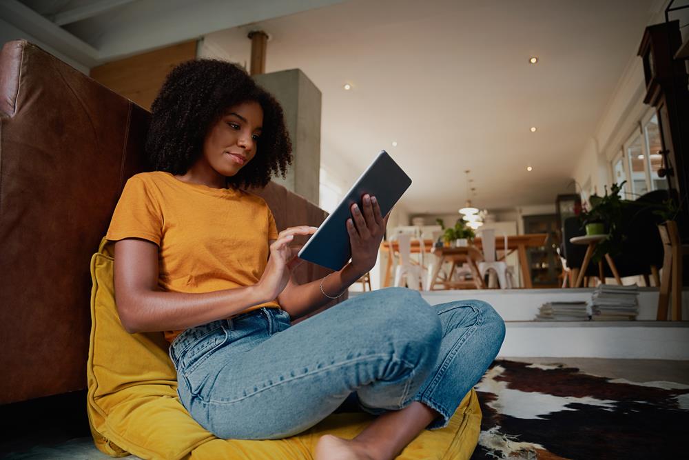 young-woman-sitting-home-on-floor